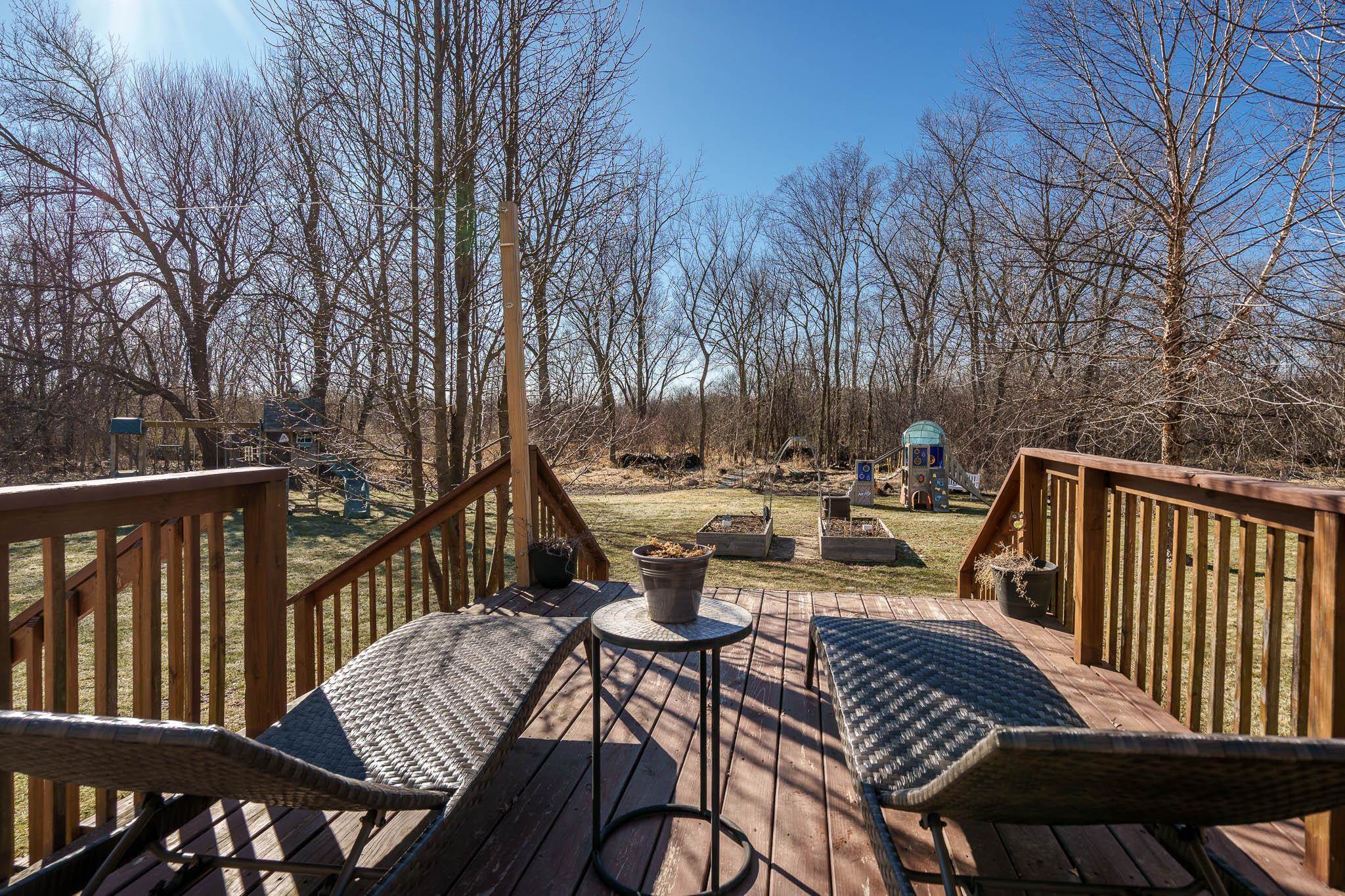 651 Genoa Street Cherry Valley, IL 61016 - Photo 52 of 70 a view of a balcony with furniture