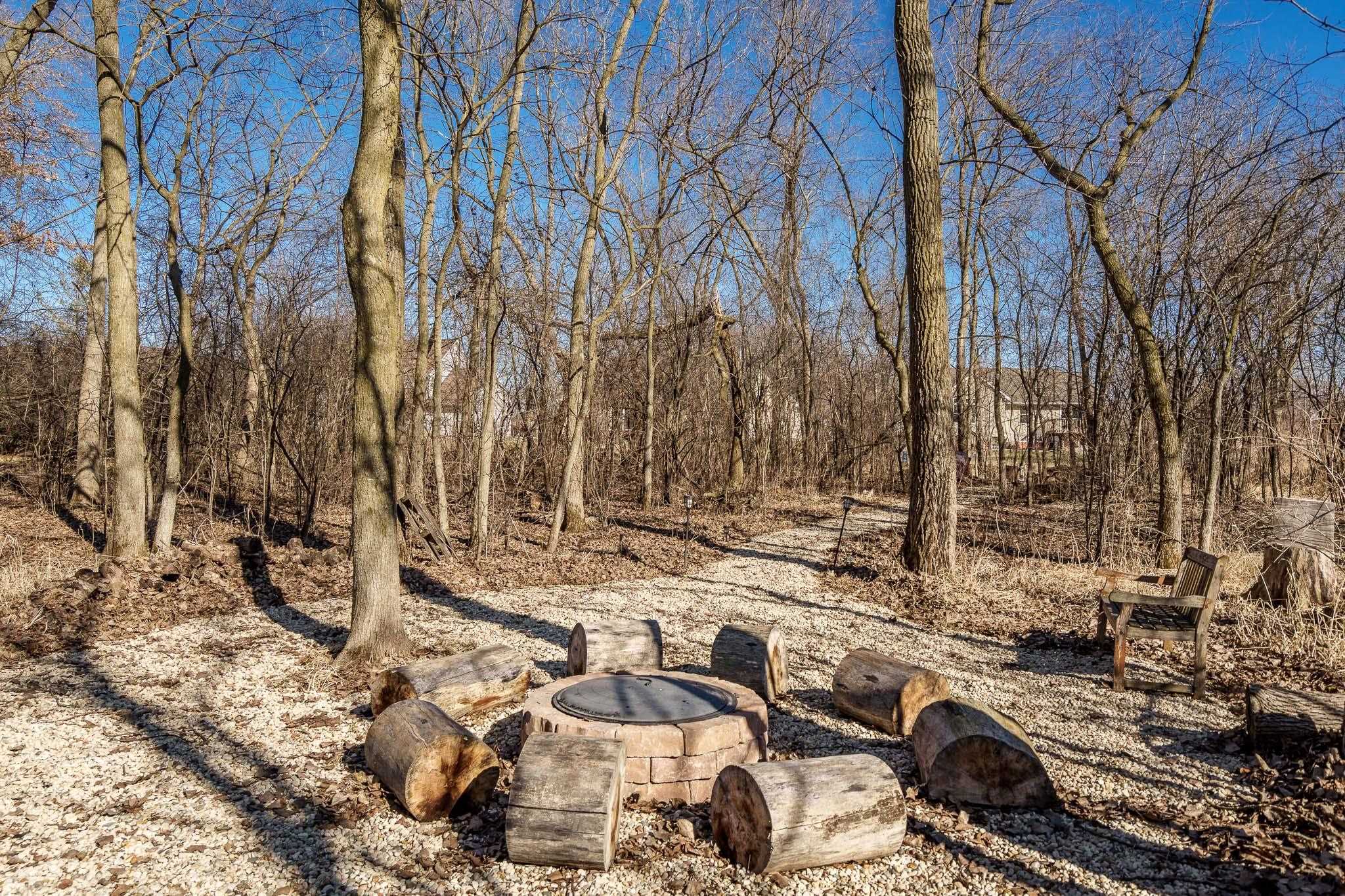651 Genoa Street Cherry Valley, IL 61016 - Photo 58 of 70 a view of a yard with cars