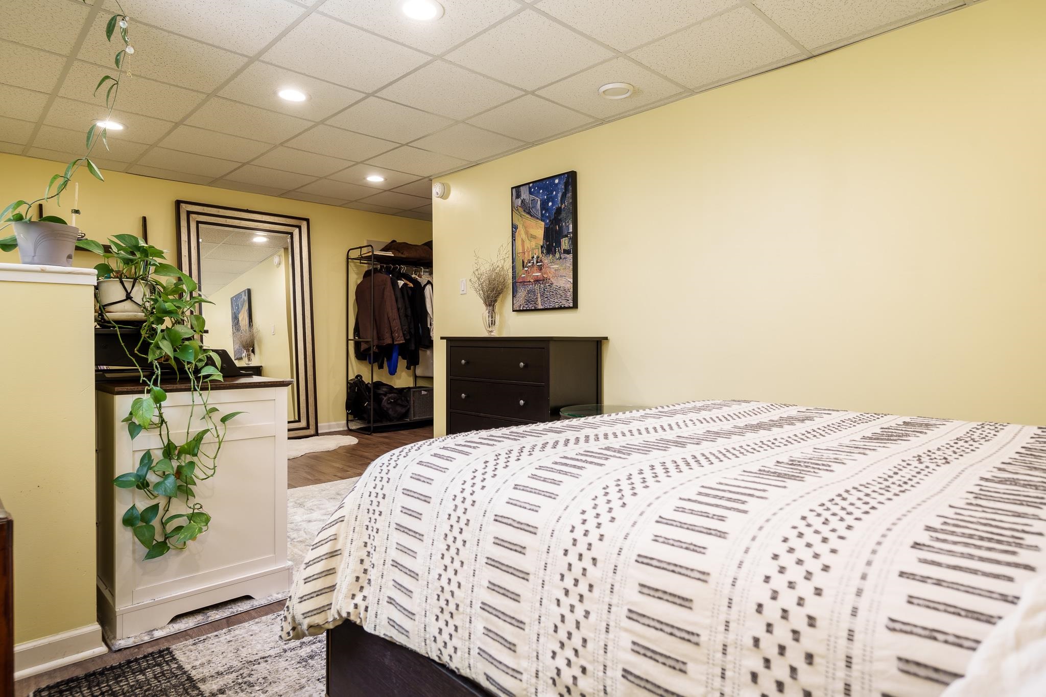 651 Genoa Street Cherry Valley, IL 61016 - Photo 70 of 70 a bed room with a bed mirror and a night stand