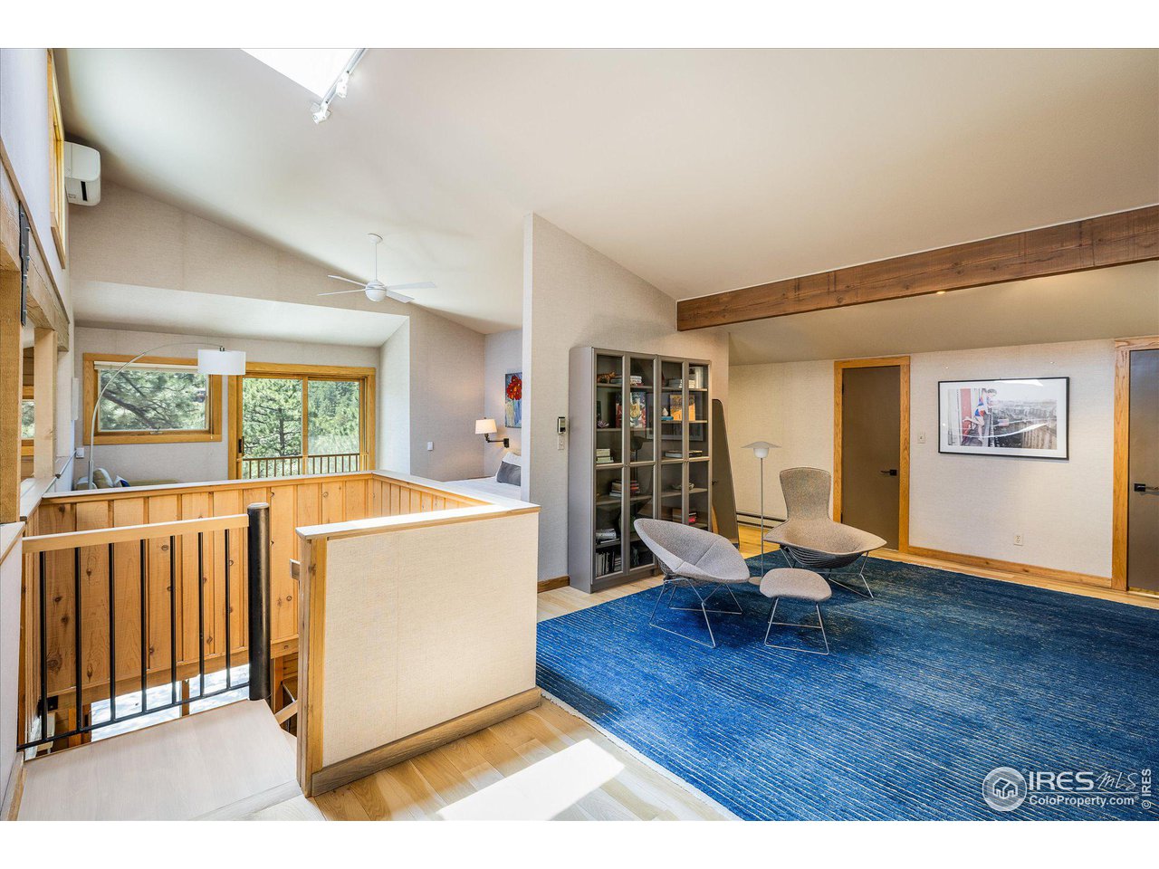 156 Betasso Road Boulder, CO 80302 - Photo 19 of 38 a living room with furniture and a wooden floor