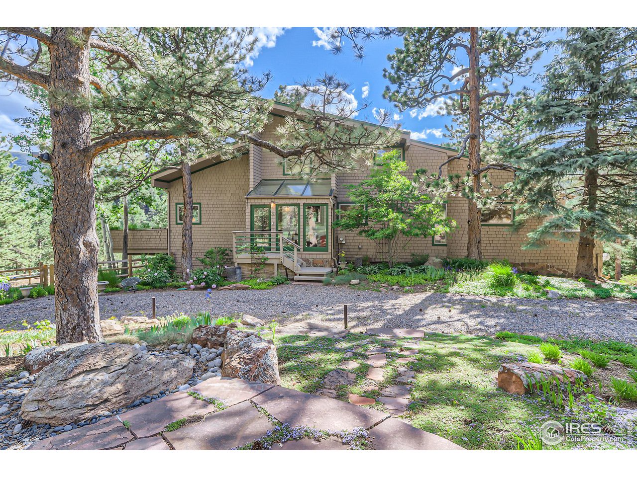 156 Betasso Road Boulder, CO 80302 - Photo 2 of 38 a front view of a house with garden