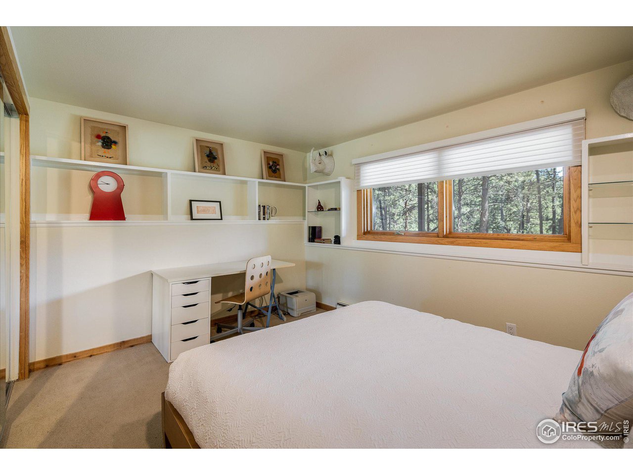 156 Betasso Road Boulder, CO 80302 - Photo 22 of 38 a bedroom with a bed and a window