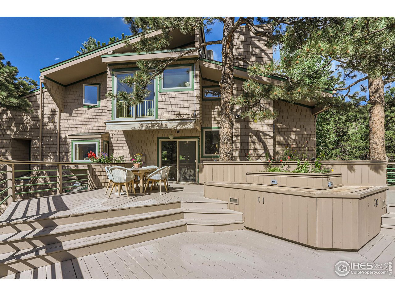 156 Betasso Road Boulder, CO 80302 - Photo 24 of 38 a view of a house with sitting area and furniture