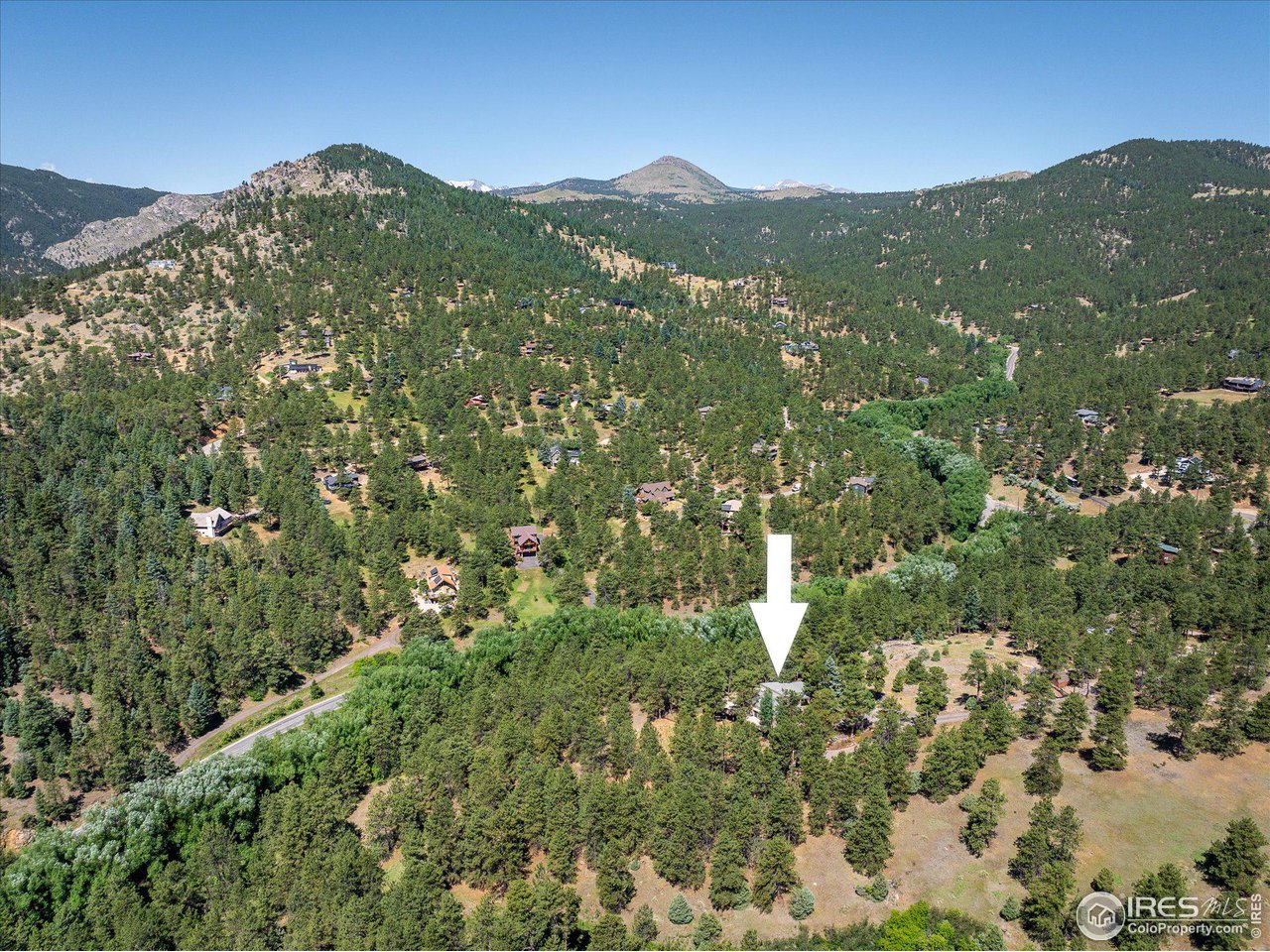 156 Betasso Road Boulder, CO 80302 - Photo 32 of 38 a view of a lush green hillside and houses
