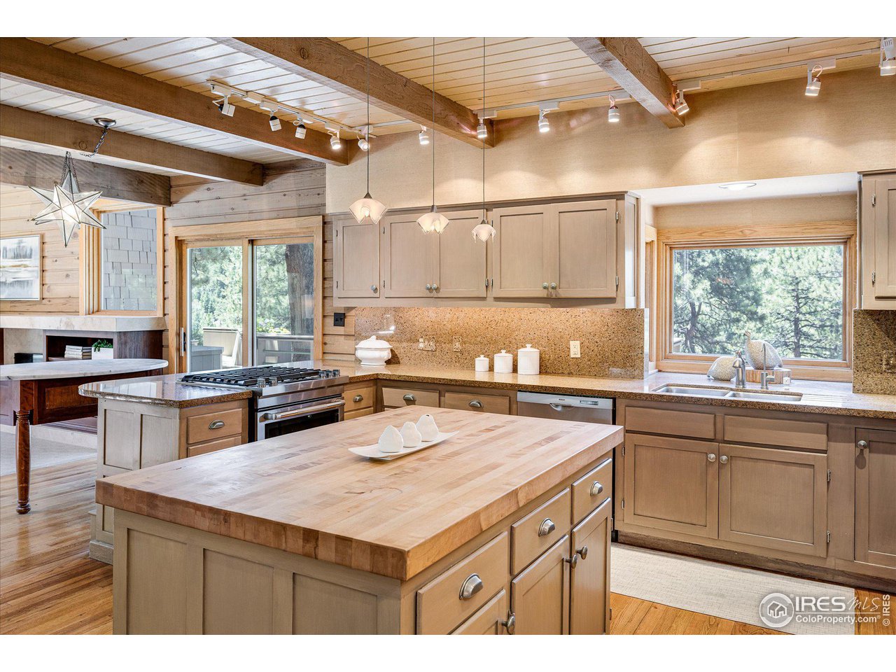 156 Betasso Road Boulder, CO 80302 - Photo 9 of 38 a kitchen with sink cabinets and window