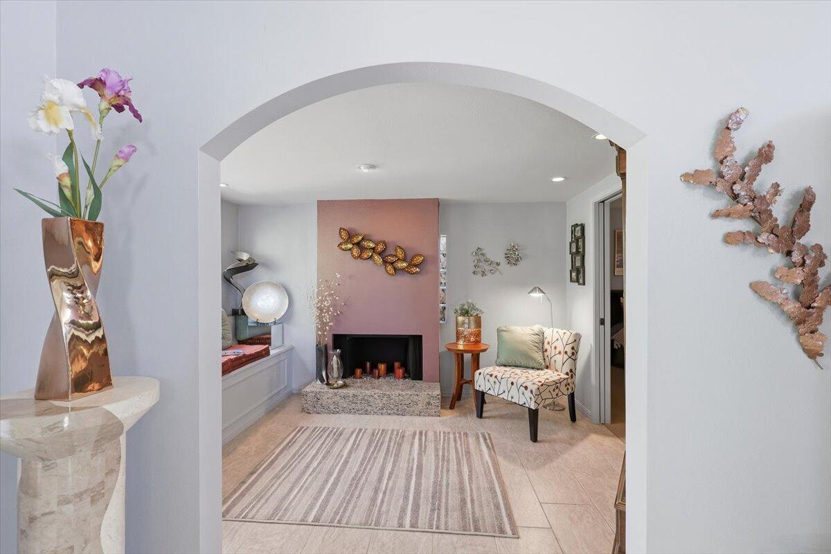 200 East Racquet Club Road, Unit 2 Palm Springs, CA 92262 - Photo 35 of 56 a living room with furniture and a fireplace