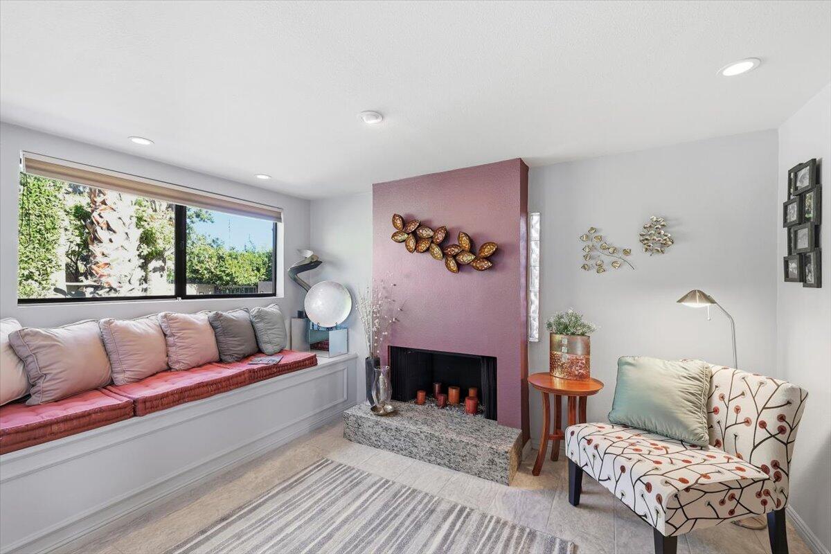 200 East Racquet Club Road, Unit 2 Palm Springs, CA 92262 - Photo 36 of 56 a living room with furniture and a fireplace