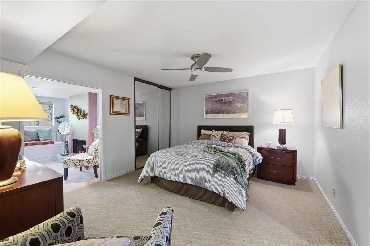 200 East Racquet Club Road, Unit 2 Palm Springs, CA 92262 - Photo 41 of 56 a bedroom with a bed and furniture