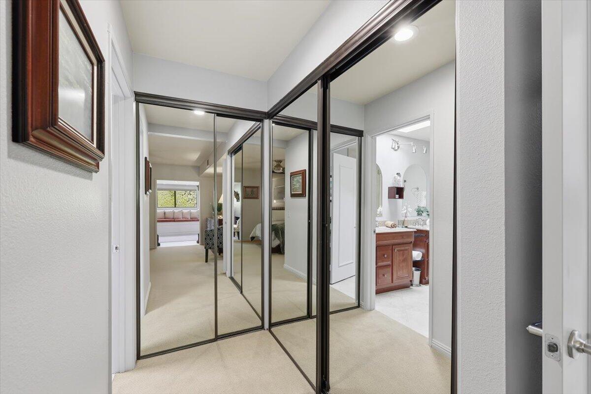 200 East Racquet Club Road, Unit 2 Palm Springs, CA 92262 - Photo 43 of 56 a bathroom with a glass shower door and a mirror