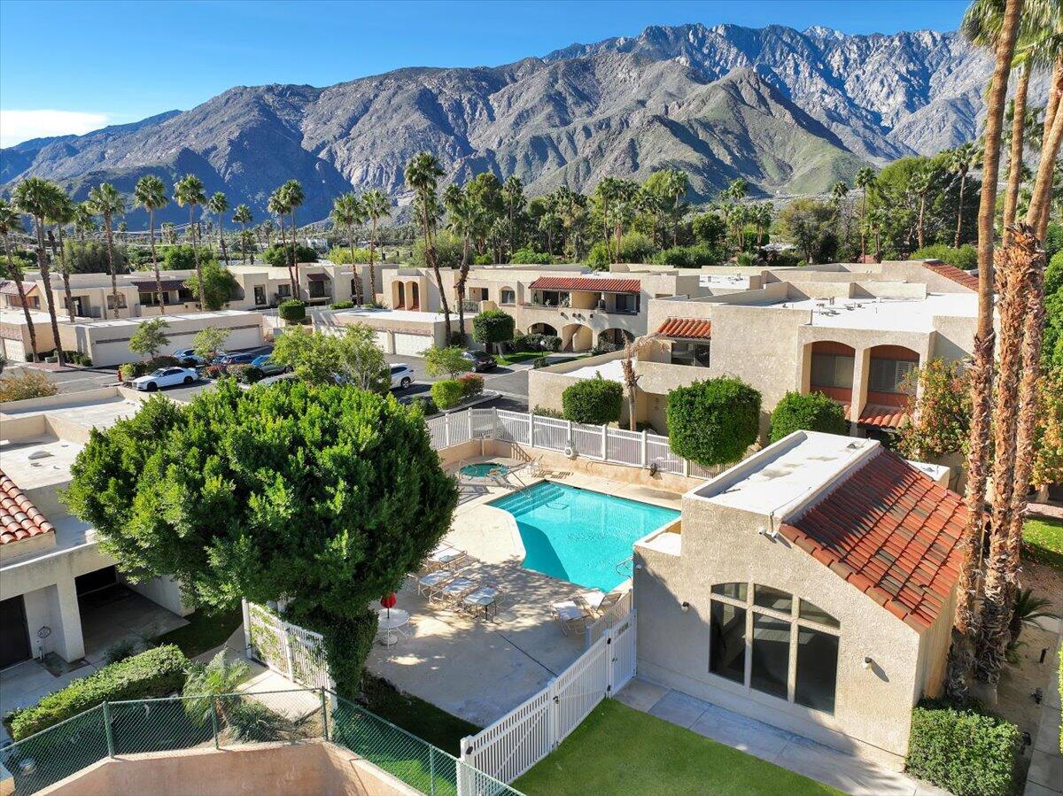 200 East Racquet Club Road, Unit 2 Palm Springs, CA 92262 - Photo 52 of 56 a view of yard from outdoor seating