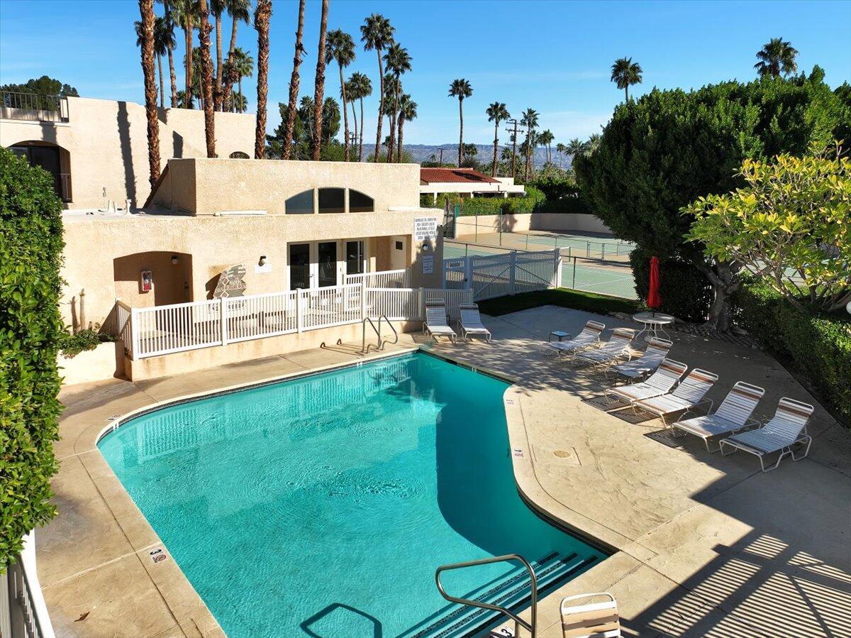 200 East Racquet Club Road, Unit 2 Palm Springs, CA 92262 - Photo 53 of 56 swimming pool view with a outdoor seating space