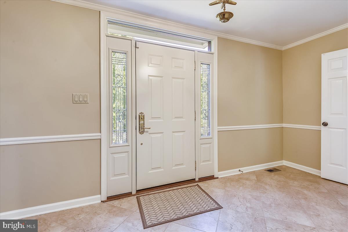 9340 Reach Road Potomac, MD 20854 - Photo 23 of 43 New tile in Foyer