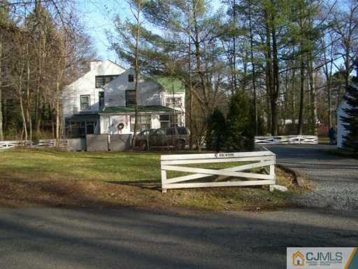 1 Devon Road Colonia, NJ 07067 - Photo 5 of 8 a view of street with houses