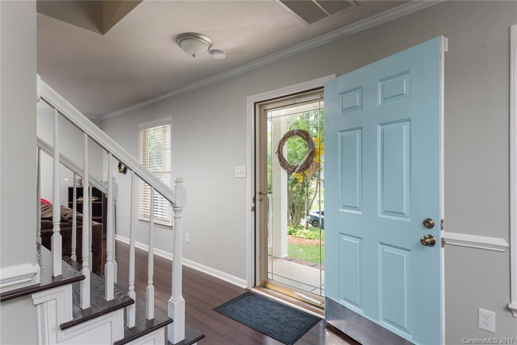 1205 Driftway Point Road Matthews, NC 28105 - Photo 3 of 24 a view of front door with wooden floor