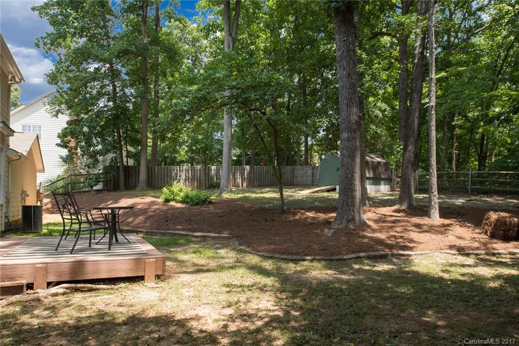 1205 Driftway Point Road Matthews, NC 28105 - Photo 21 of 24 a view of a house with a yard