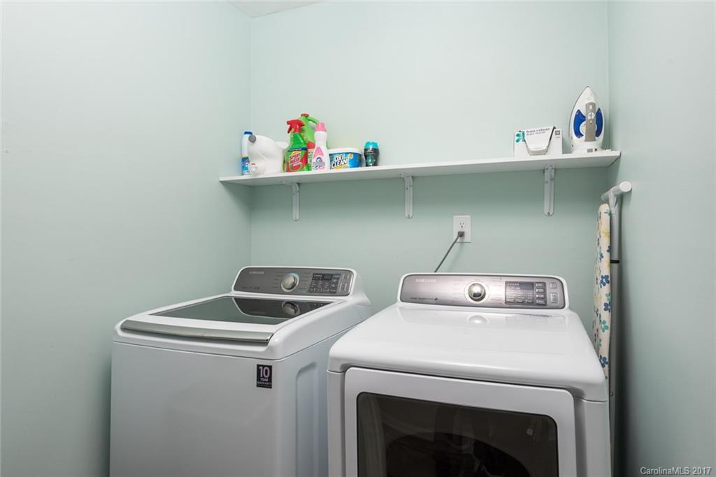 1205 Driftway Point Road Matthews, NC 28105 - Photo 10 of 24 a utility room with dryer and washer