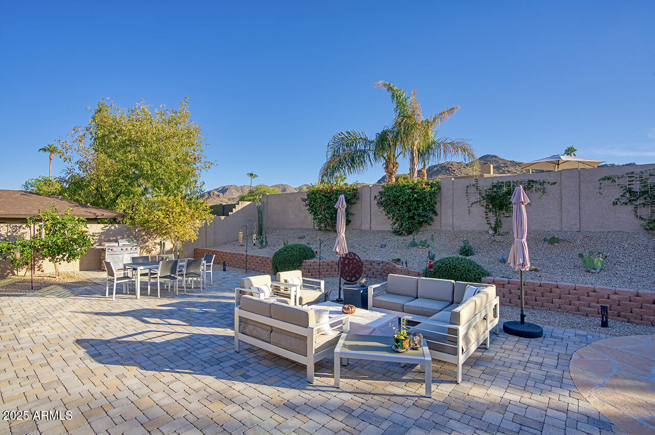 3337 East Las Rocas Drive Phoenix, AZ 85028 - Photo 21 of 22 a building outdoor space with patio furniture