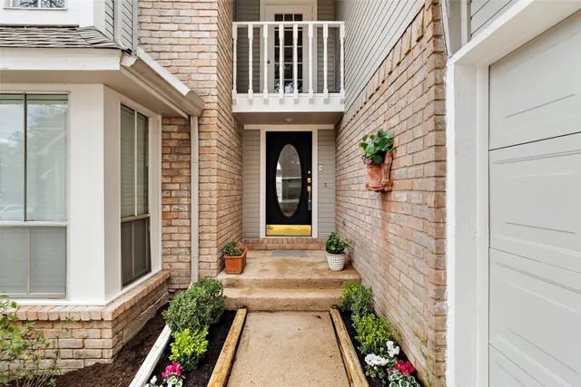 a front view of a house with a porch