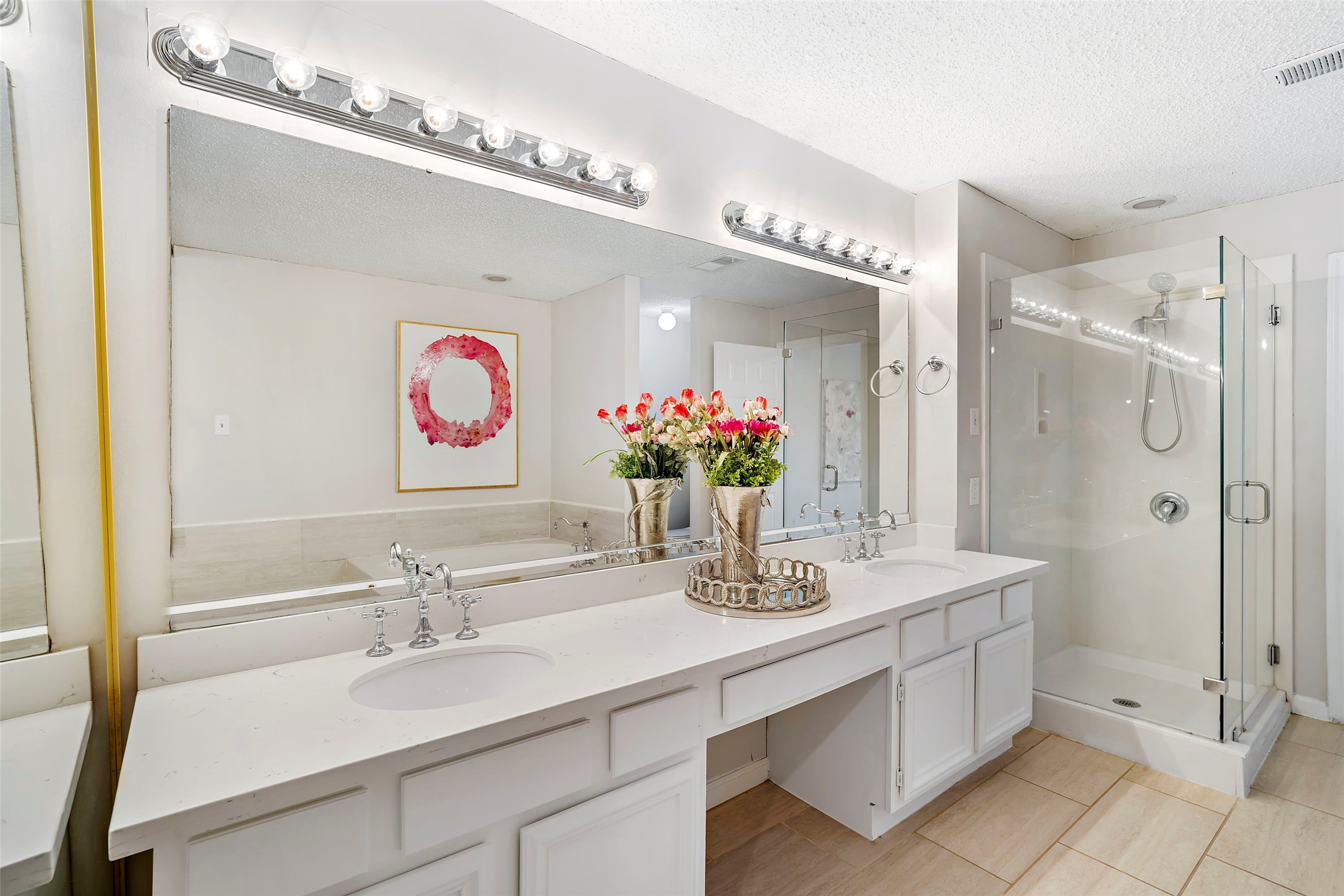12800 Briar Forest Drive, Unit 48 Houston, TX 77077 - Photo 23 of 36 a bathroom with a sink double vanity and a mirror