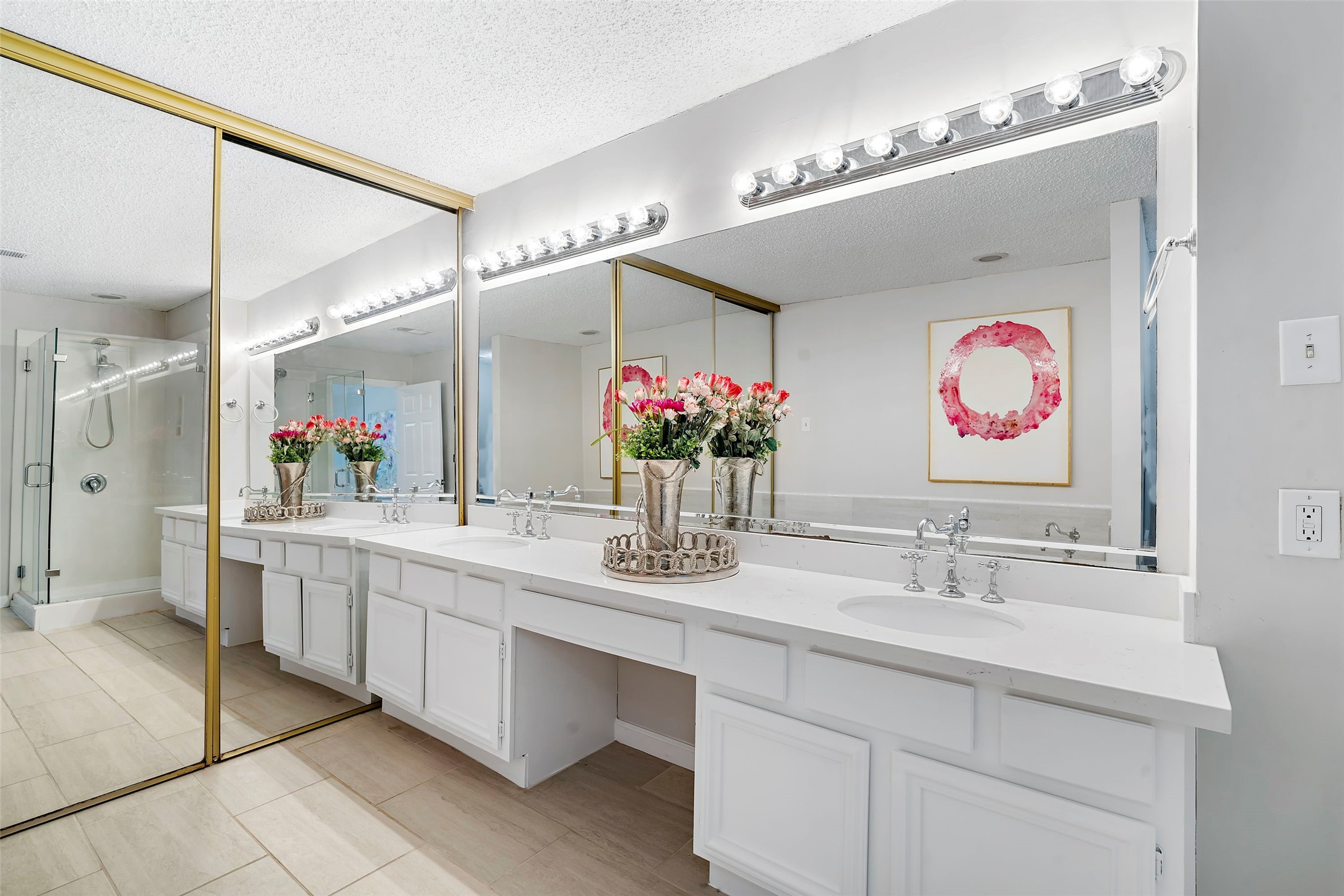 12800 Briar Forest Drive, Unit 48 Houston, TX 77077 - Photo 31 of 36 a bathroom with a double vanity sink mirror and double