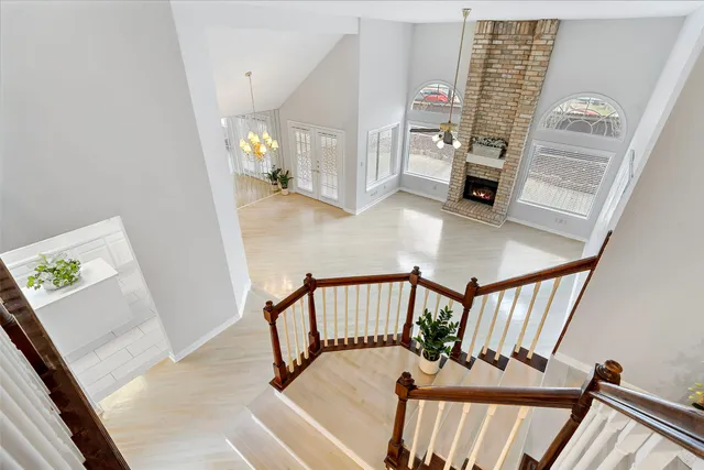 a view of an entryway with wooden floor