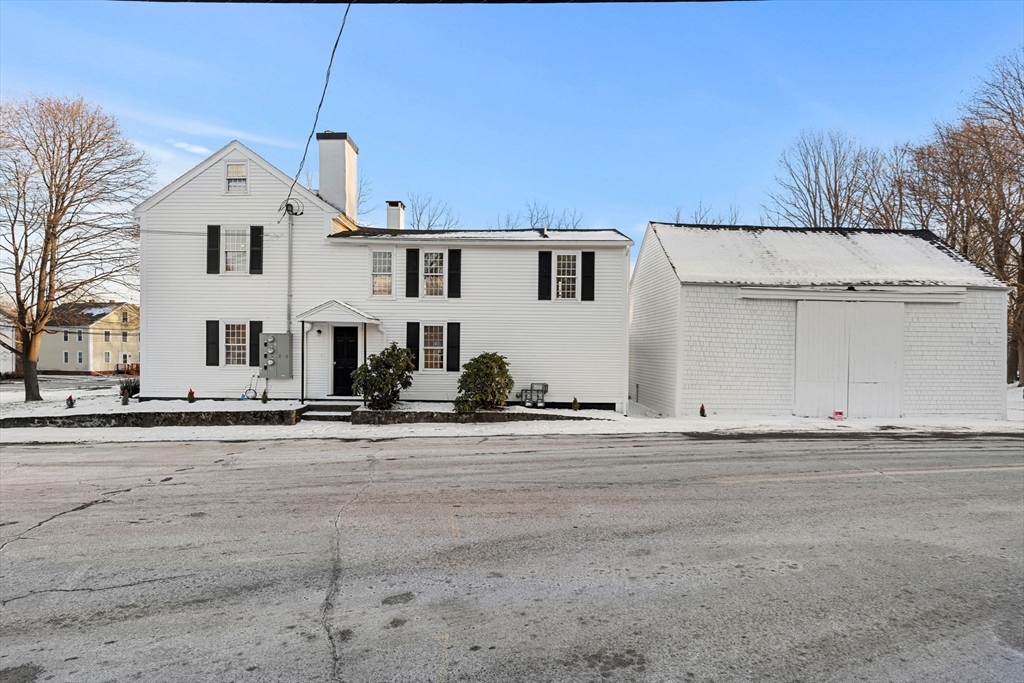34 Central Street, Unit 1 Rowley, MA 01969 - Photo 24 of 27 a view of a white house