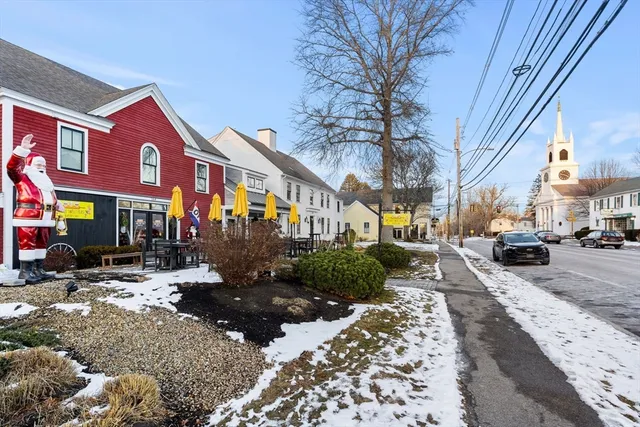 a view of a street with cars