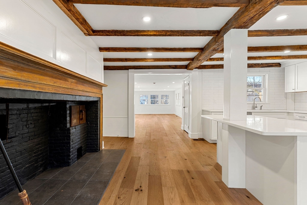 34 Central Street, Unit 1 Rowley, MA 01969 - Photo 10 of 27 a view of a hallway with wooden floor