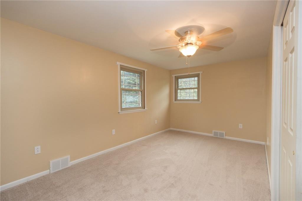 1153 Pentland Avenue Rochester, PA 15074 - Photo 12 of 23 2nd bedroom is almost as large as the master with all new light fixtures, paint and carpet as well.