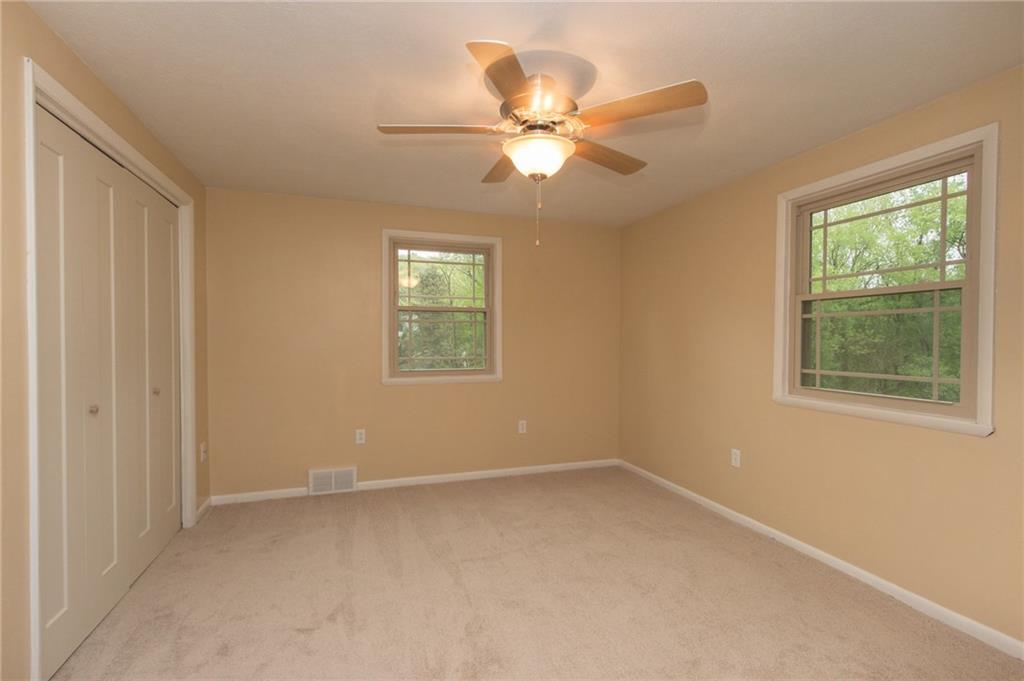 1153 Pentland Avenue Rochester, PA 15074 - Photo 14 of 23 3rd bedroom is a great size also with all new light fixtures, carpet and paint.