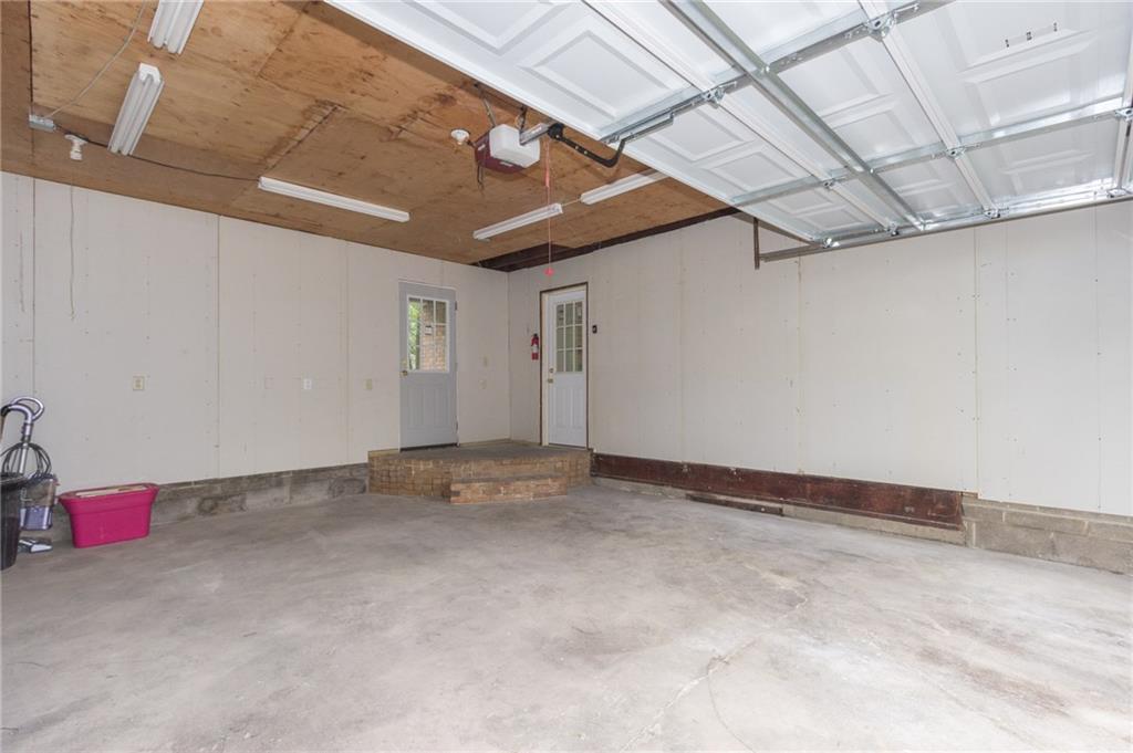 1153 Pentland Avenue Rochester, PA 15074 - Photo 18 of 23 Nice sized 2 car garage off the kitchen with brand new garage doors! Garage walks out to back covered patio.