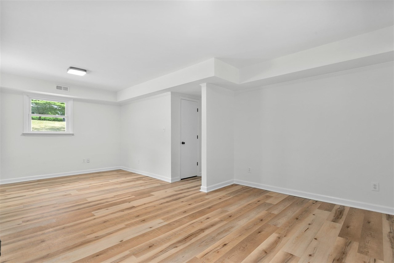 6816 Valley Drive Raleigh, NC 27612 - Photo 14 of 30 Living/Family Lower Level