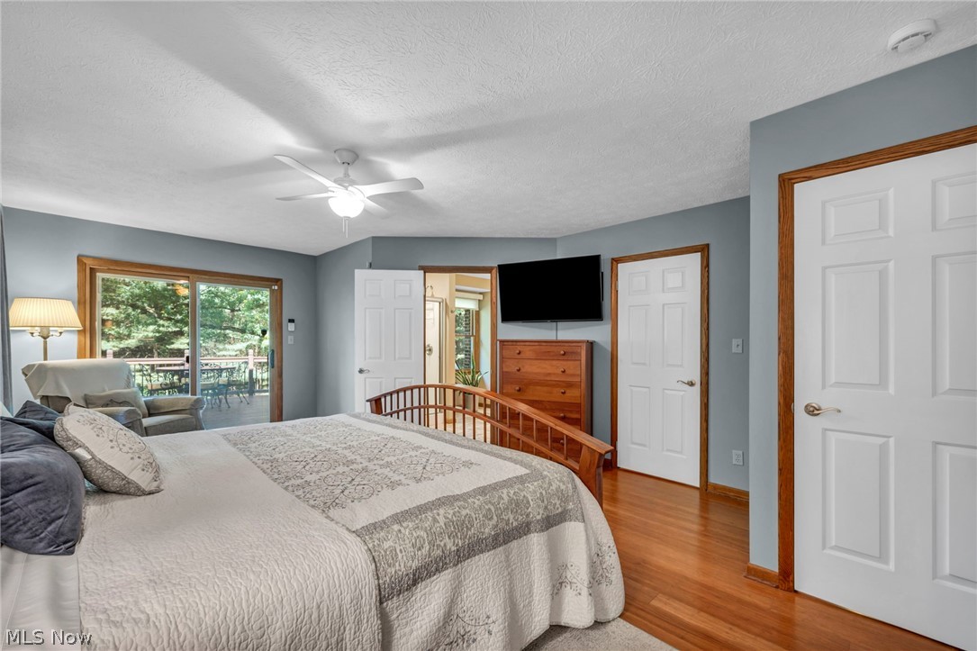 1057 Congress Lake Road Mogadore, OH 44260 - Photo 13 of 50 Bamboo flooring in primary bedroom as well!