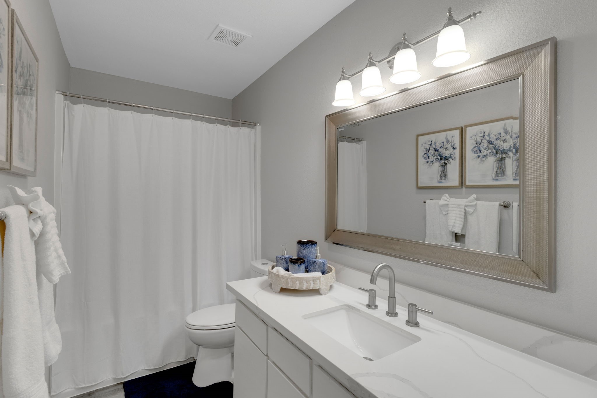 90 Harbour Lane Coldspring, TX 77331 - Photo 12 of 40 Full bathroom with tub and shower combination and updated vanity