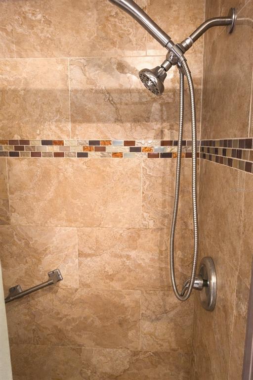 2237 Viento Street Orlando, FL 32822 - Photo 12 of 14 a bathroom with a shower