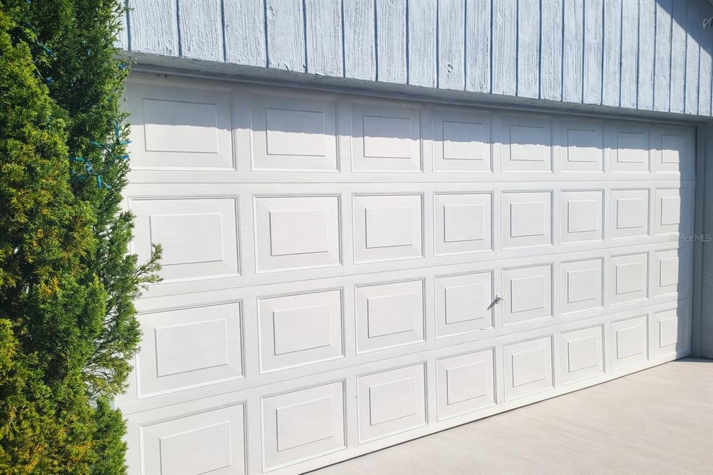2237 Viento Street Orlando, FL 32822 - Photo 2 of 14 a view of white kitchen with granite countertop white cabinets