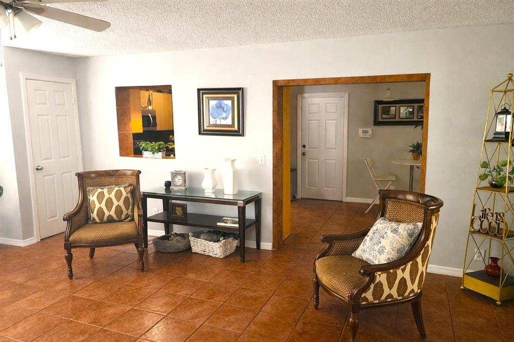 2237 Viento Street Orlando, FL 32822 - Photo 6 of 14 a living room with furniture and wooden floor