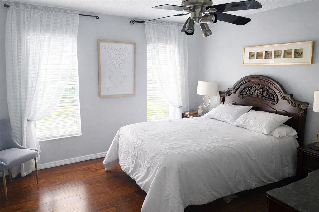 2237 Viento Street Orlando, FL 32822 - Photo 10 of 14 a bedroom with a bed and window