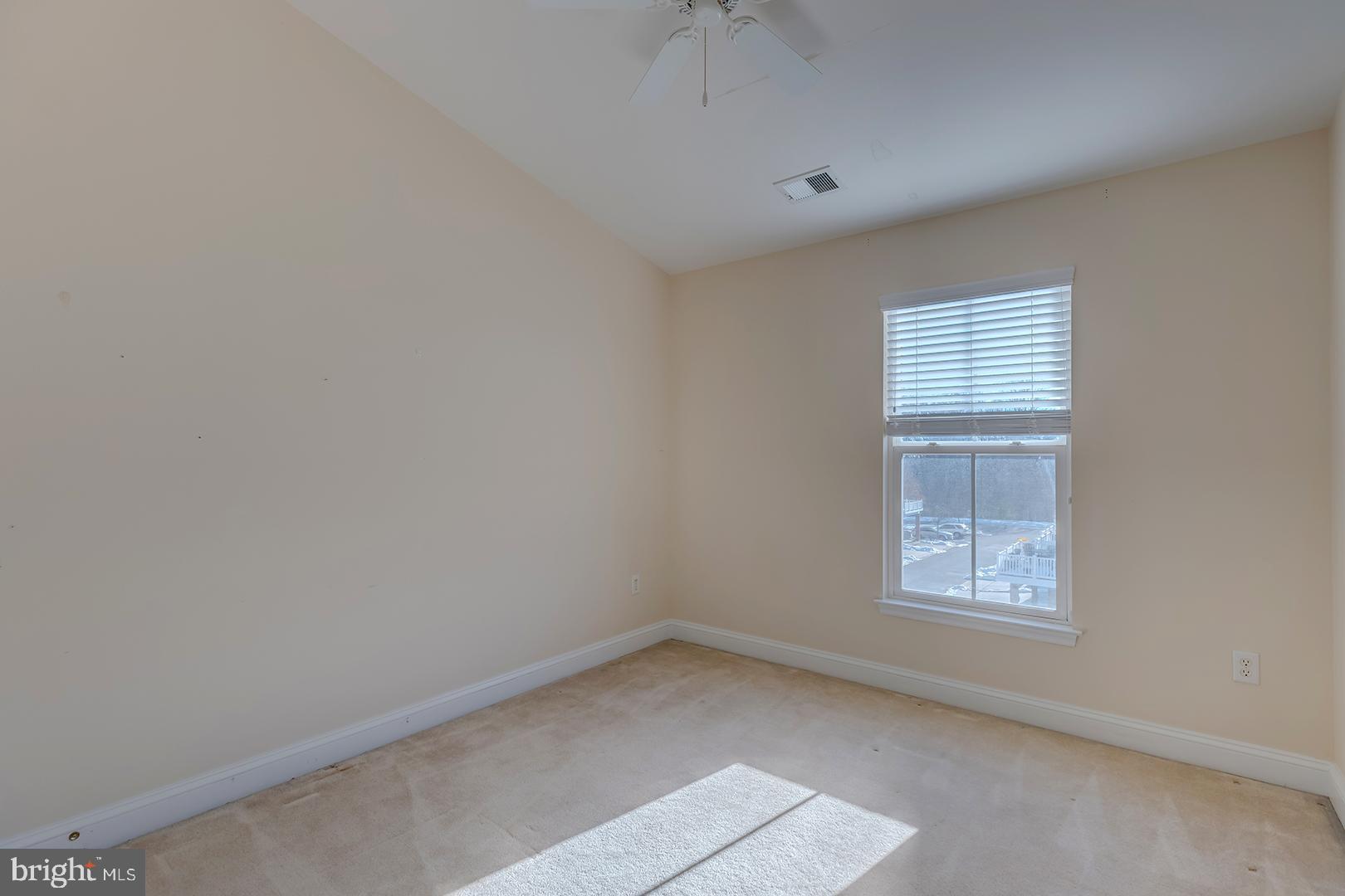 1010 Verdigris Way Odenton, MD 21113 - Photo 19 of 38 an empty room with a window