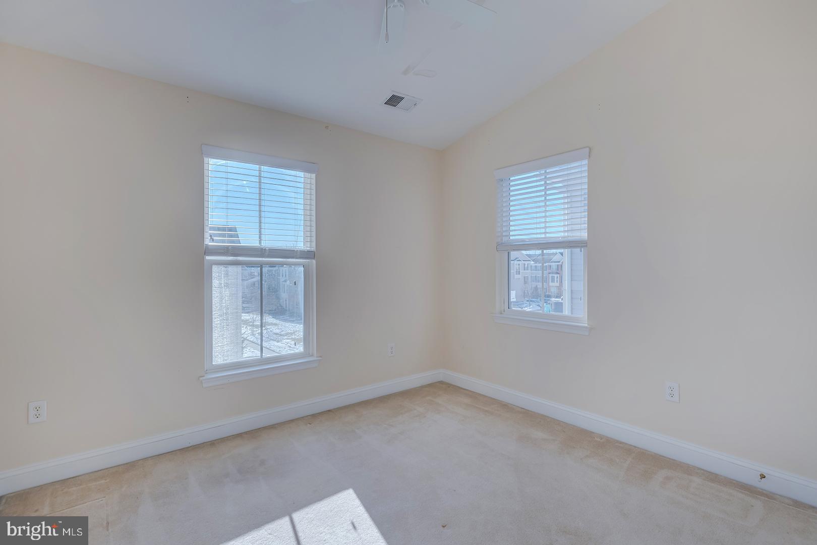 1010 Verdigris Way Odenton, MD 21113 - Photo 21 of 38 an empty room with windows