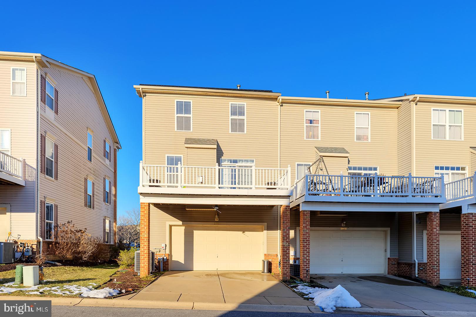 1010 Verdigris Way Odenton, MD 21113 - Photo 32 of 38 a front view of a building with sitting area