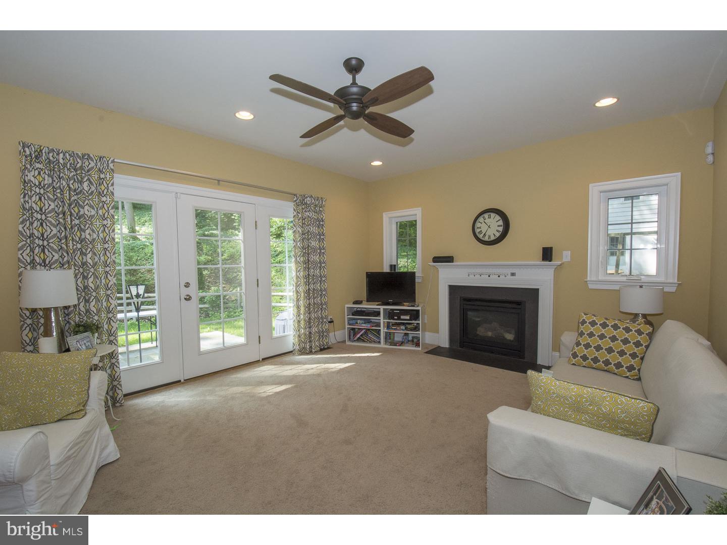 427 Iven Avenue Wayne, PA 19087 - Photo 11 of 24 a living room with furniture and a fireplace
