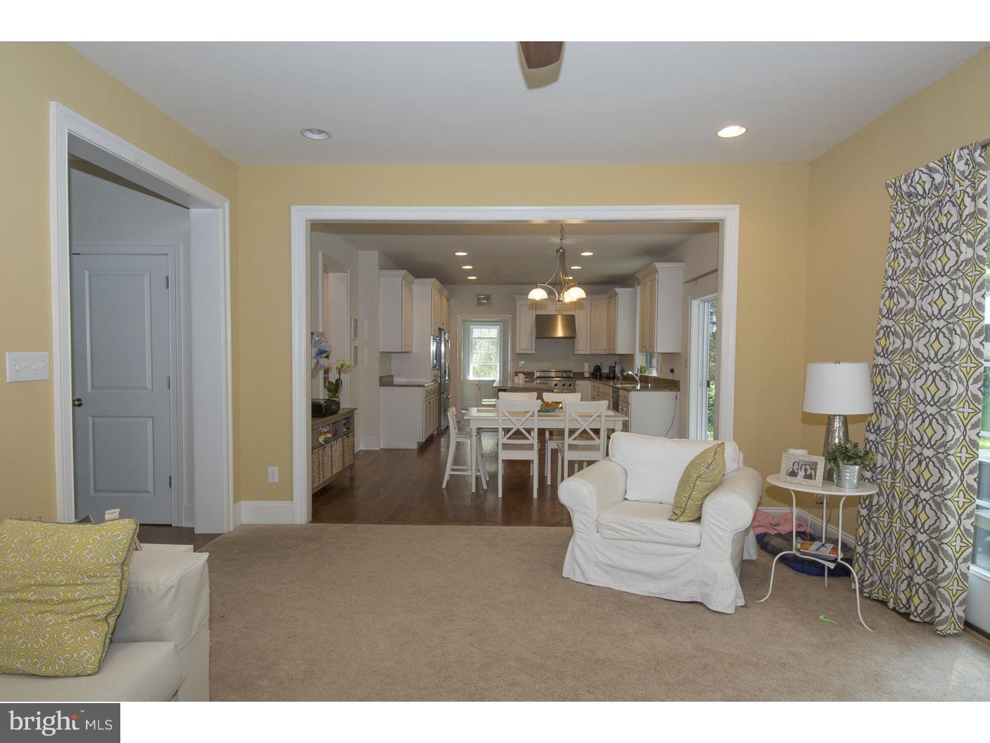 427 Iven Avenue Wayne, PA 19087 - Photo 12 of 24 a living room with furniture and a dining table