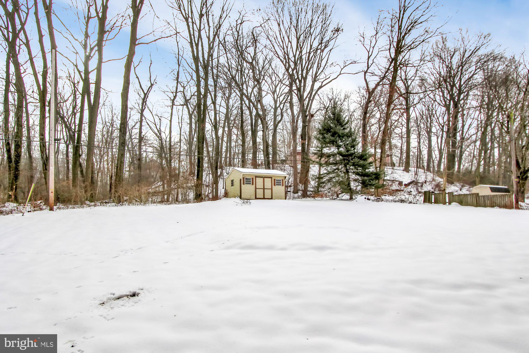 3390 Kingston Road York, PA 17402 - Photo 24 of 27 Backyard with Storage Shed
