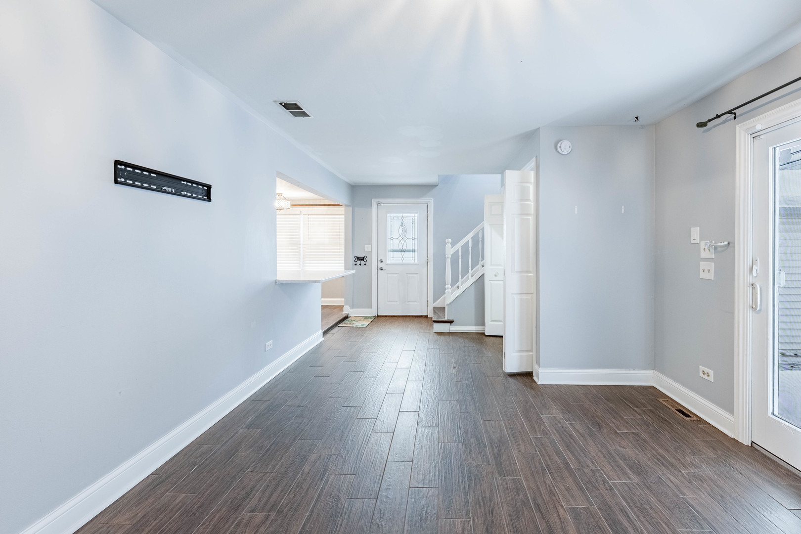 8912 South Ryan Road Hometown, IL 60456 - Photo 14 of 23 a view of a room with wooden floor and window