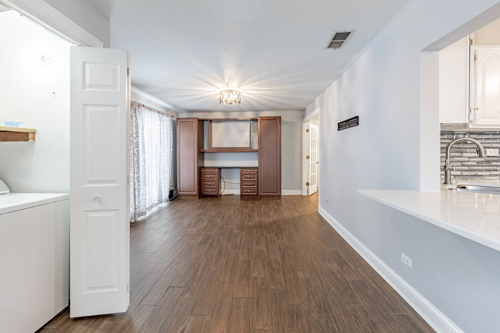 8912 South Ryan Road Hometown, IL 60456 - Photo 15 of 23 a view of empty room with wooden floor and window