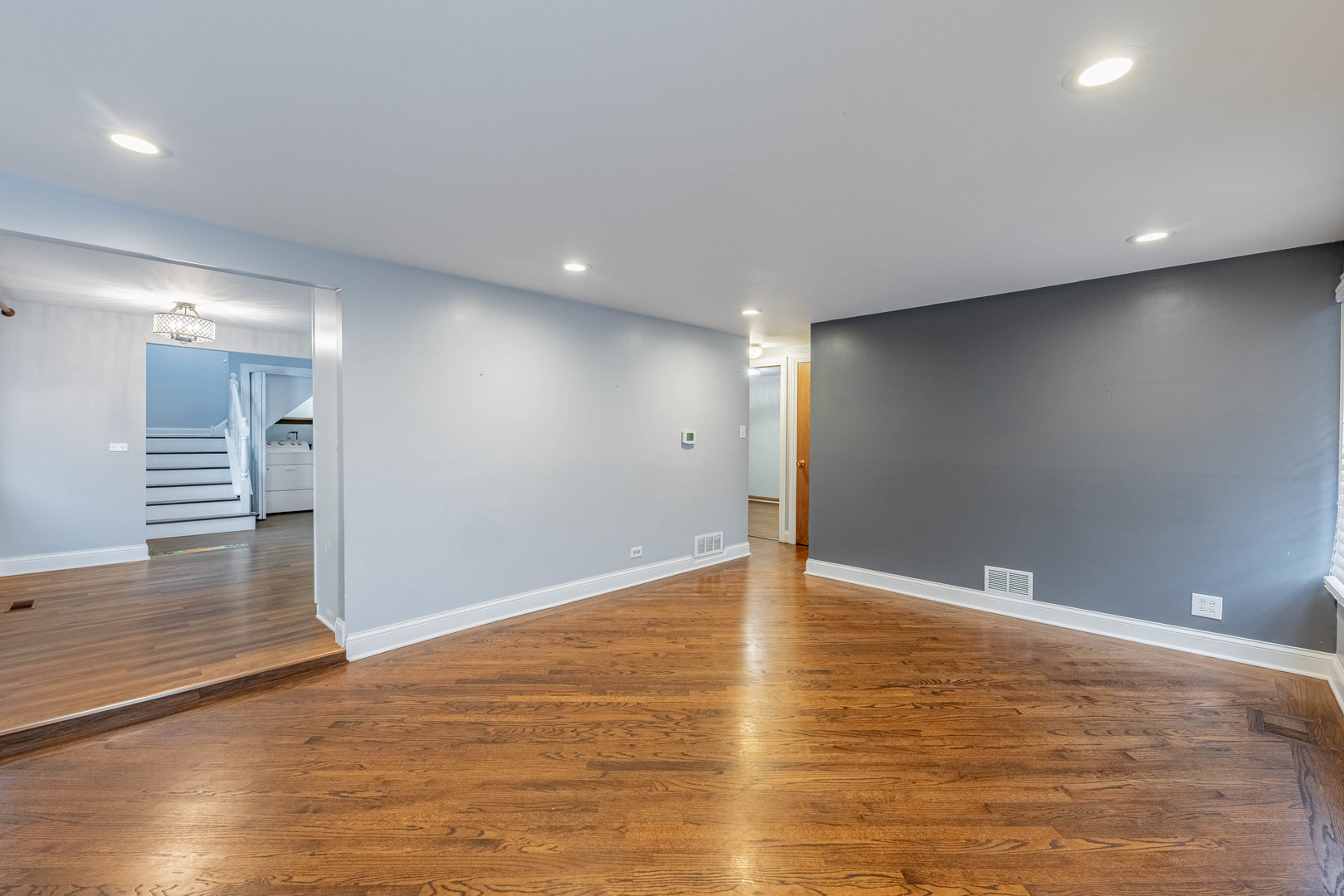 8912 South Ryan Road Hometown, IL 60456 - Photo 5 of 23 a view of an empty room with wooden floor and a window