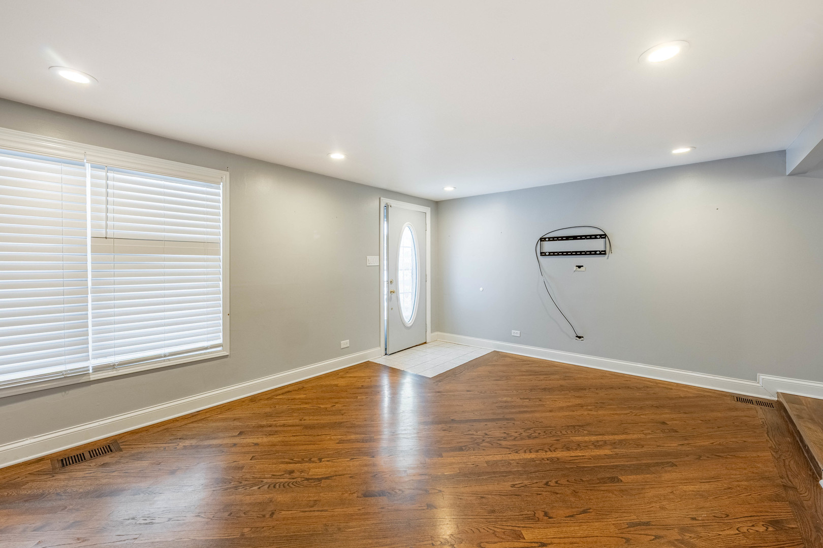 8912 South Ryan Road Hometown, IL 60456 - Photo 6 of 23 a view of empty room with wooden floor