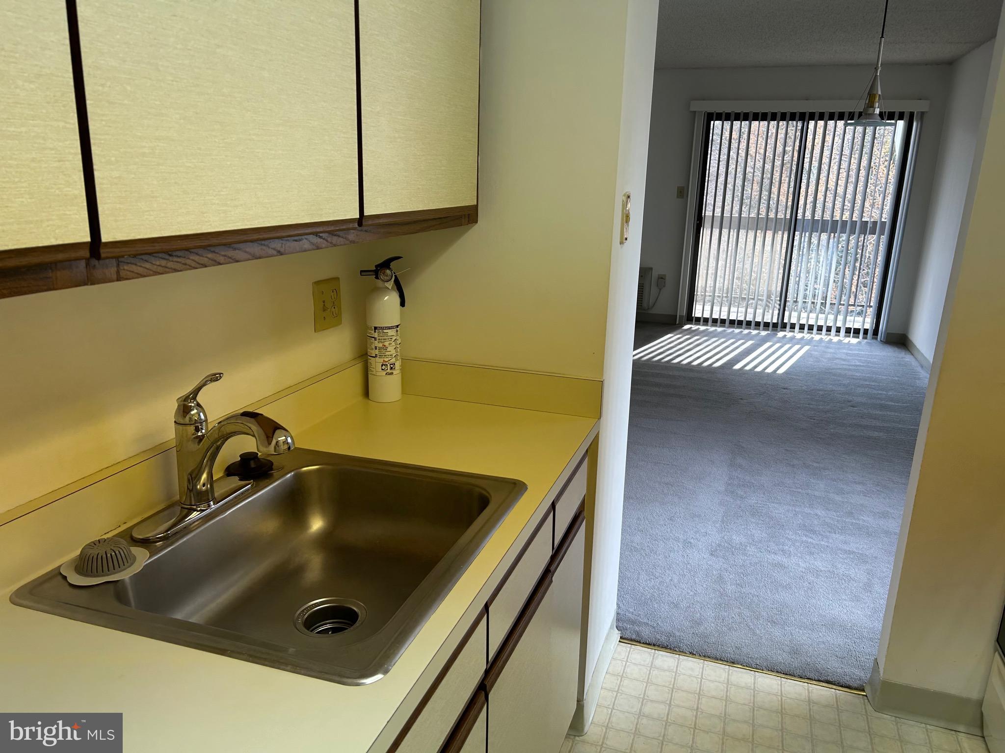 800 Avondale Road, Unit 7M Wallingford, PA 19086 - Photo 11 of 14 a bathroom with a sink and a window