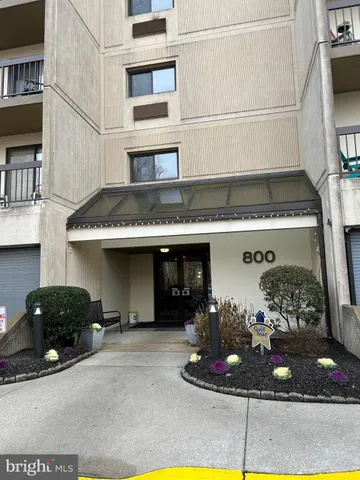 a kitchen with a stove and cabinets